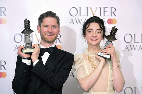 Kyle Soller and Patsy Ferran at the Olivier Awards ceremony in London, Sunday April 7, 2019. (Ian West/PA via AP)