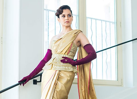 Kangana Ranaut rocks the red carpet at Cannes. She's wearing a Falguni Shane Peacock corset and a Kanjivaram sari by Madhurya Creations. #GreyGooseLife #LiveVictoriously #Cannes2019 #QueenAtCannes