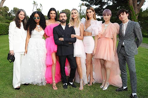 Giambattista Valli (centre) at the amfAR Gala