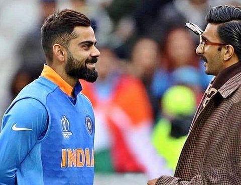 Ranveer Singh with Virat Kohli after the match against Pakistan