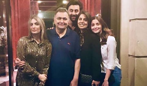 Alia Bhatt poses for pictures with Ranbir Kapoor's family
