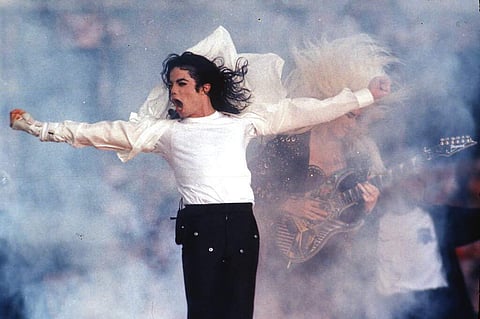 FILE - This Feb. 1, 1993 file photo shows Pop superstar Michael Jackson performing during the halftime show at the Super Bowl in Pasadena.