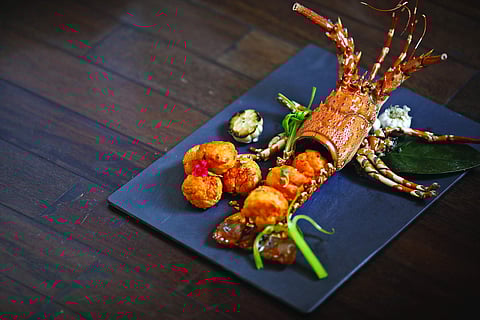 New menu at Golden Dragon, Taj Coromandel, Chennai, curated by Master Chef Lian Yun Lei. Crispy Lobster with Chili Butter Sauce.