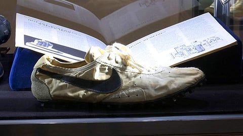 The Nike handmade Moon Shoe, designed by Nike co-founder Bill Bowerman in 1972, among 100 pairs of rare sneakers up for auction at Sotheby's. Bidding runs through July 23. (AP Photo/Ted Shaffrey)