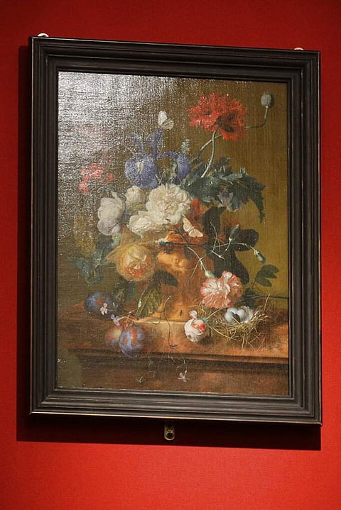 Unveiling of 'Vase of Flowers' by Jan van Huysum, at the Pitti Palace, Uffizi Galleries, in Florence, Italy. Germany returned the Dutch painting after it was stolen in WWII. (AP Photo/Gregorio Borgia)