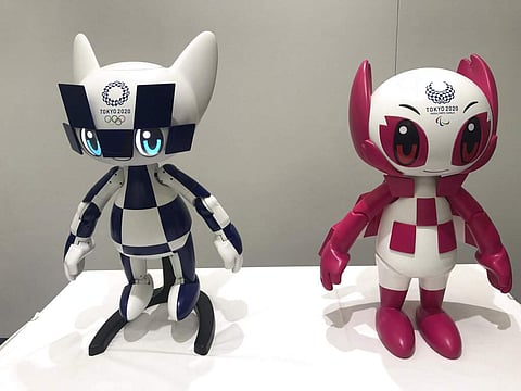 Robots of Olympics mascots Miraitowa and Paralympics Someity revealed at Toyota Motor Corp. HQ in Tokyo. (AP Photo/Yuri Kageyama)