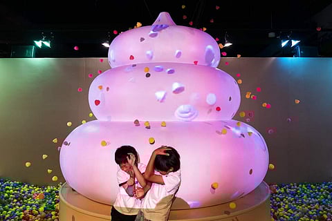 A pop-up show at Unko Museum in the port city of Yokohama is all about unko, a Japanese word for poop. The installations get cute makeovers in the shape of ice cream or cupcakes. (AP Photo/Jae C Hong)