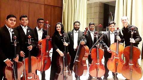 Members of the Kolkata Symphony Orchestra with guest conductor Avery Waite