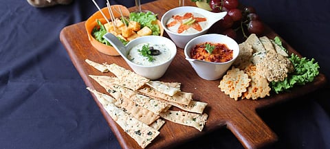 Gluten free peri peri crackers with a range of dips at Biscotti