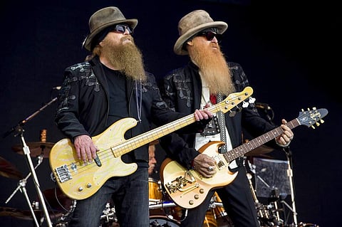 File photo: Dusty Hill and Billy Gibbons of ZZ Top (Photo by Jonathan Short/Invision/AP)