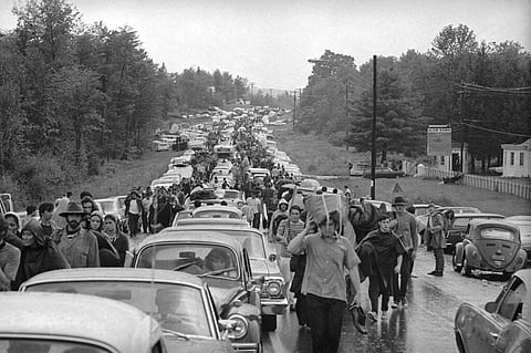 1969 file photo: Rock music fans jam a highway leading from Bethel, NY as they try to leave the Woodstock Music and Art Festival. (AP Photo)