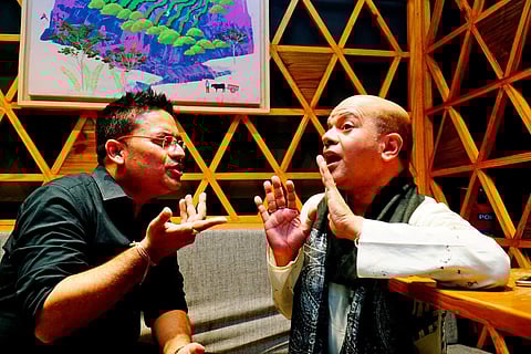 Sudarshan Chakraborty and Indroneil Maitra have a friendly chat