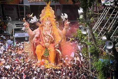 As Lord Ganesha bids adieu, devotees participate in immersion rally in Mumbai (Photo courtesy: IANS)
