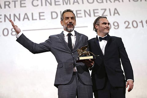 Todd Phillips and Joaquin Phoenix at Venice (Photo by Joel C Ryan/Invision/AP)
