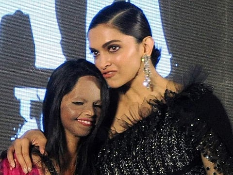 Jan 03 (ANI): Bollywood actress Deepika Padukone along with acid survivor Laxmi Agarwal during the title song launch of their upcoming film 'Chhapaak' in Mumbai on Friday. (ANI Photo)
