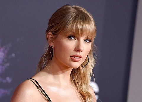 Singer-songwriter Taylor Swift won her third consecutive artist of the year prize at the American Music Awards
