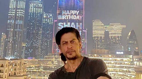 Shah Rukh Khan in front of Burj Khalifa