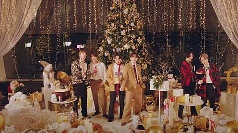 K-pop stars BTS have released a new version of their hit song, Dynamite, as a special gift to fans during the holiday season.