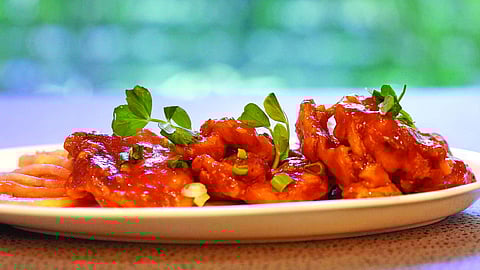 Sliced fish with tomato