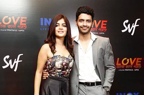 The lead pair - Arjun and Madhumita strike a pose before the screening