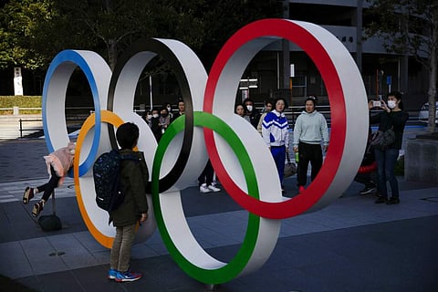 Olympic rings near the New National Stadium, Tokyo (AP Photo/Jae C Hong)
