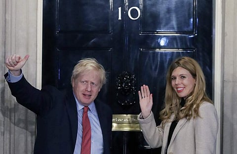 Boris Johnson and Carrie Symonds (AP Photo/Matt Dunham)