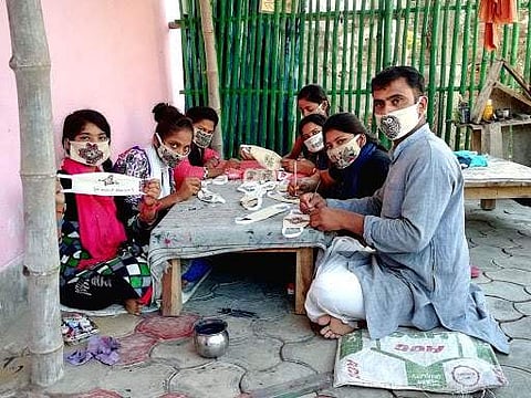 Bihar couple use Madhubani art on face masks to write anti-coronavirus slogans