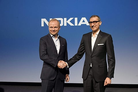 Pekka Lundmark and Rajeev Suri (AFP/Lehtikuva/Markku Ulander)