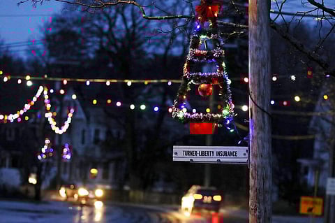 Holiday lights are going back up (AP Photo/Charles Krupa)