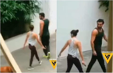 A screengrab featuring Alia Bhatt, Ranbir Kapoor and his pet, Lionel. (Courtesy: Viral Bhayani)