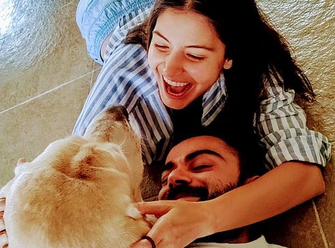Anushka Sharma, Virat Kohli and their pet dog