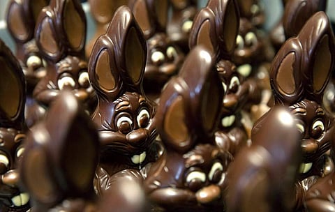 Chocolate rabbits wait to be decorated at Cocoatree in Lonzee, Belgium. Many chocolatiers have resorted to online sales, home delivery or pick up on site during lockdown. (AP Photo/Virginia Mayo)