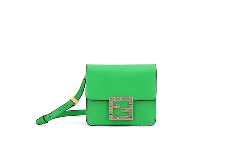 The compact flap bag is a crossbody and is designed with a new squared 'FF' logo buckle by Creative Director Silvia Venturini Fendi.