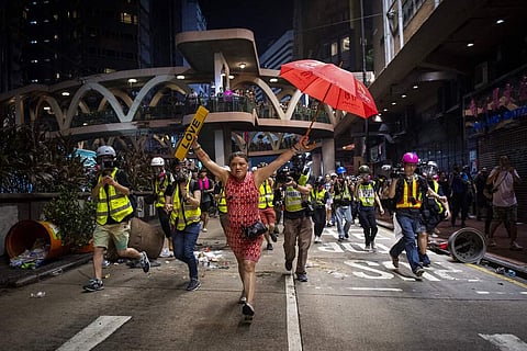 Nicolas Asfouri won first prize in General News Stories for this pic of demonstrations in the Causeway Bay district of Hong Kong. (Nicolas Asfouri, Agence France-Presse, World Press Photo via AP)