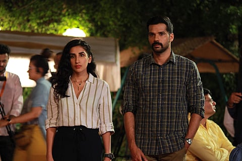 Parul and Neil in a still from the show