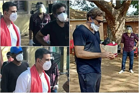 Actor Akshay Kumar and filmmaker R Balki spotted during an outdoor shoot amid the coronavirus lockdown. (Source: Twitter)