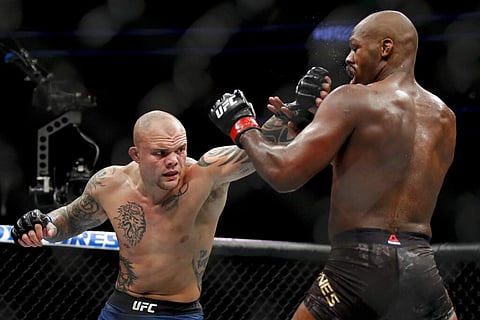 Anthony Smith and Jon Jones (AP Photo/John Locher, File)