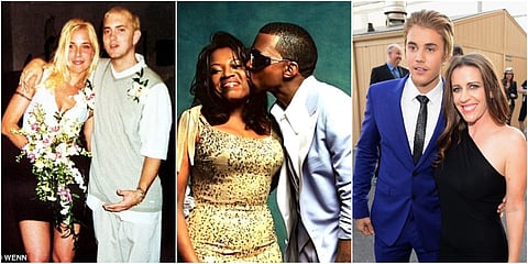 Eminem, Kanye West and Justin Bieber posing with their mothers