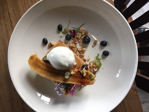 Onam special recipe: Banana Halwa Cake with Caramelized Bananas, Berries and edible flora