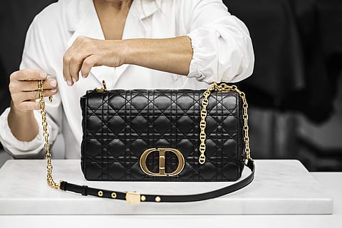 Bag addicts alert! Dior has just dropped a new bag style - the Caro