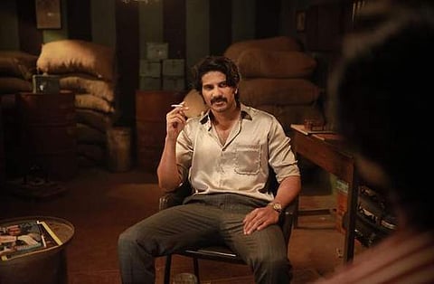 Actor-producer Dulquer Salmaan in a still from 'Kurup'