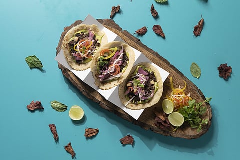 Mexican fiesta: Tinga, a new taqueria, dishes out delicious pork tacos. Scan the QR code to their Spanish chef's playlist if you're ordering in! 