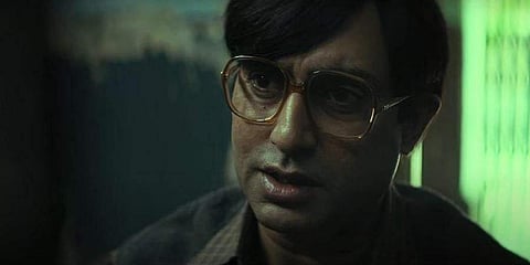 Abhishek Bachchan as the titular character in 'Bob Biswas' (Photo | YouTube Screengrab)