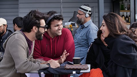 Taranveer Singh (in red) with the lead actors