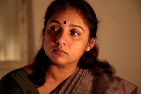 Actress Revathy in a scene from the play