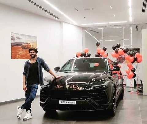 Kartik Aaryan poses next to his newly-purchased Lamborghini Urus