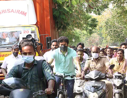 Actor Vijay rides a bicycle to the polling booth