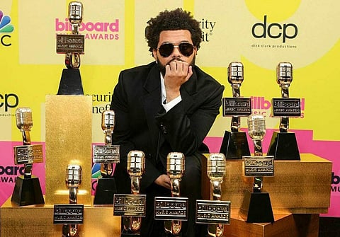 The Weeknd accepts the top hot 100 artist award at Billboard Music Awards 2021