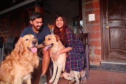 Tanveer and Priyanka with their dogs