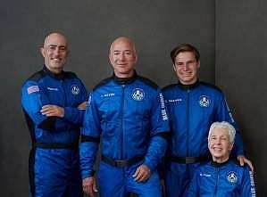 Jeff Bezos with the Blue Origin team